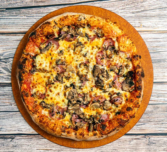Pizza with mushrooms, sausage and cheese