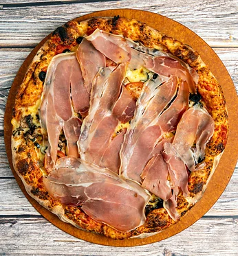 Pizza topped with prosciutto