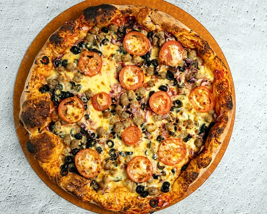 A Taste of Italy pizza with Italian sausage, black olives, red onions and tomatoes